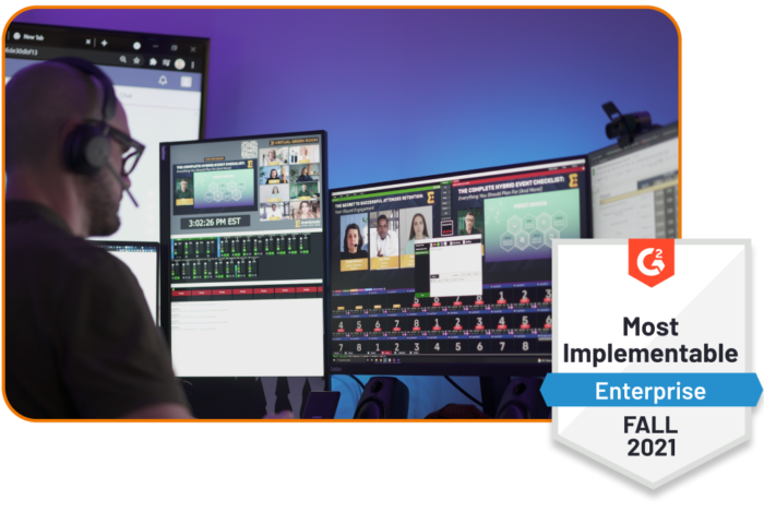 Professional managing multi-screen video production and streaming studio setup, paired with G2 badge for Most Implementable (Enterprise) Fall 2021