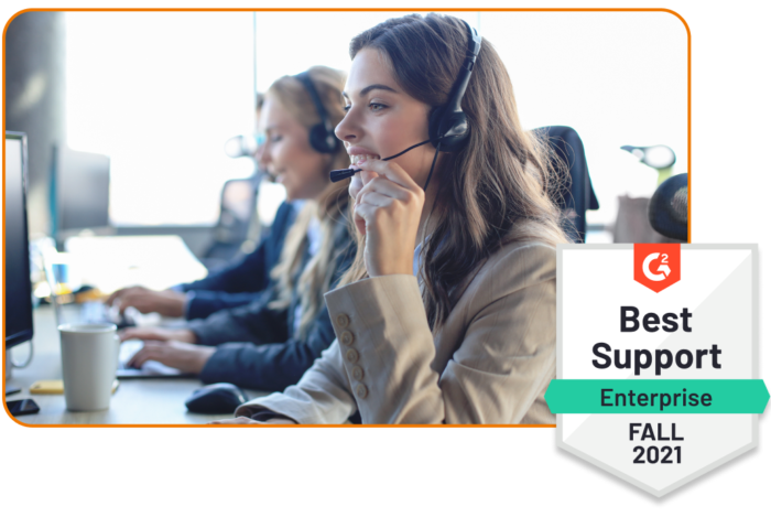 Customer Success personel on calls helping clients, paired with G2 badge for Best Support (Enterprise) Fall 2021